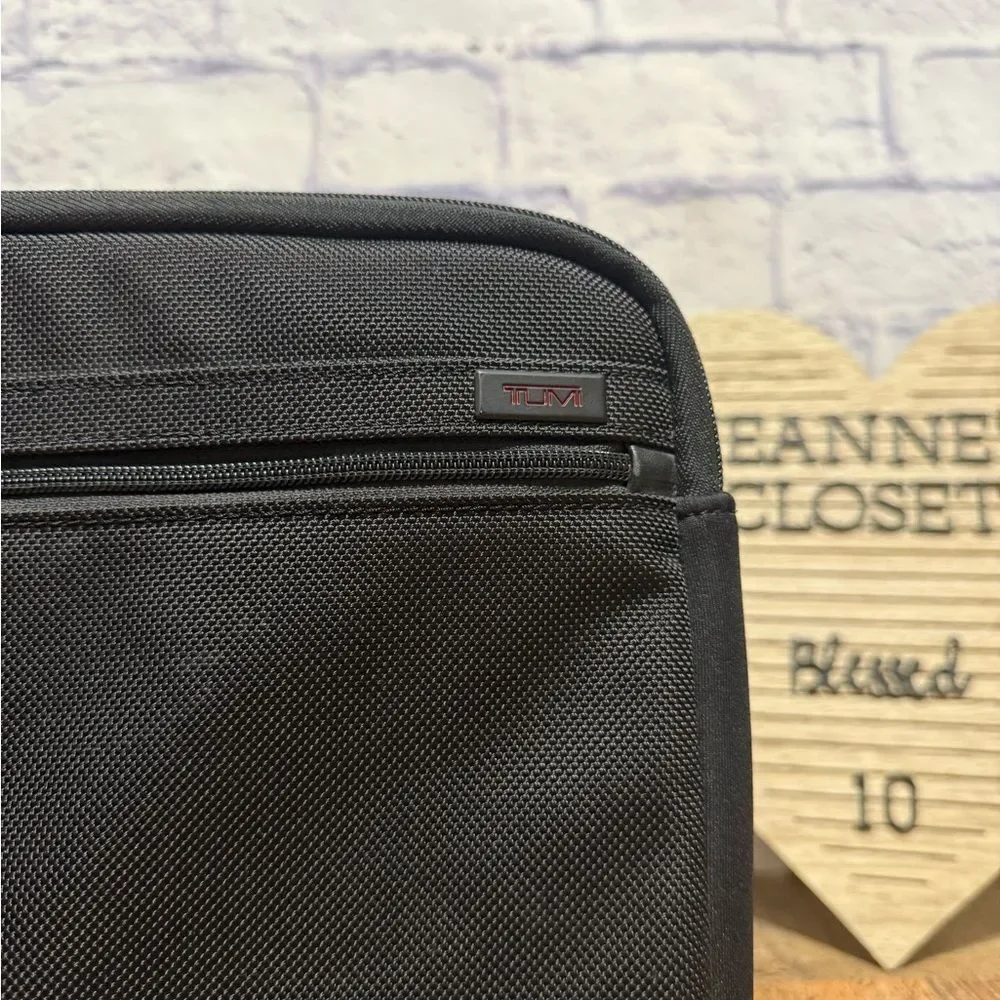 Tumi black laptop